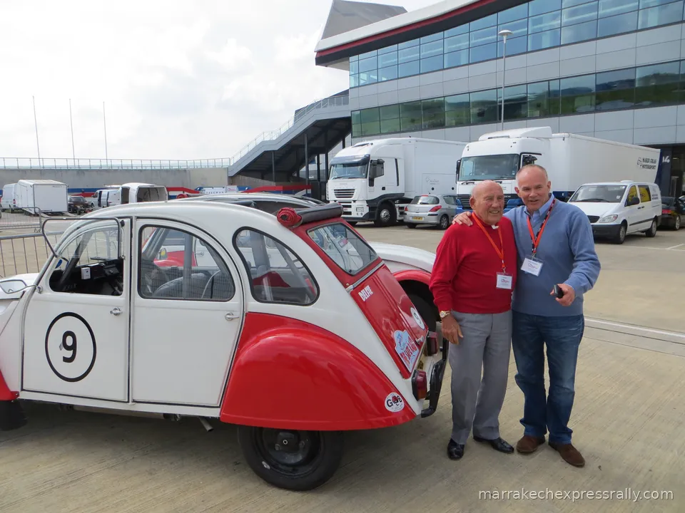 Sir Stirling Moss with veteran journalist Peter Windsor, after they had driven our 2CV round the Silverstone circuit at the Silverstone Classic Press Day on April 30 2014.