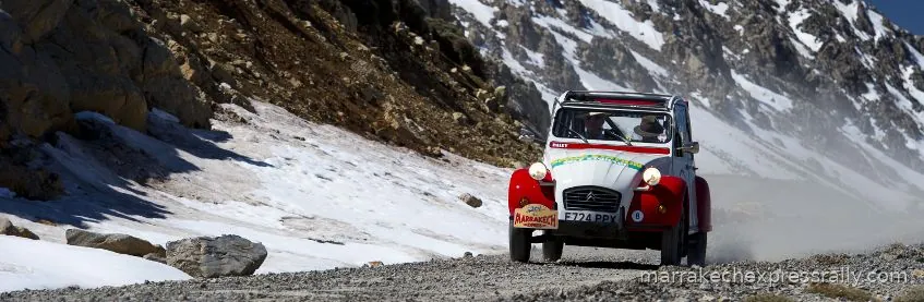 A Citroen 2CV on the road in Morocco